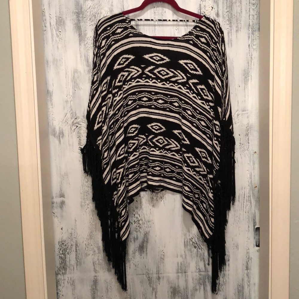 Aztec print poncho-fringe sleeves-cut our back